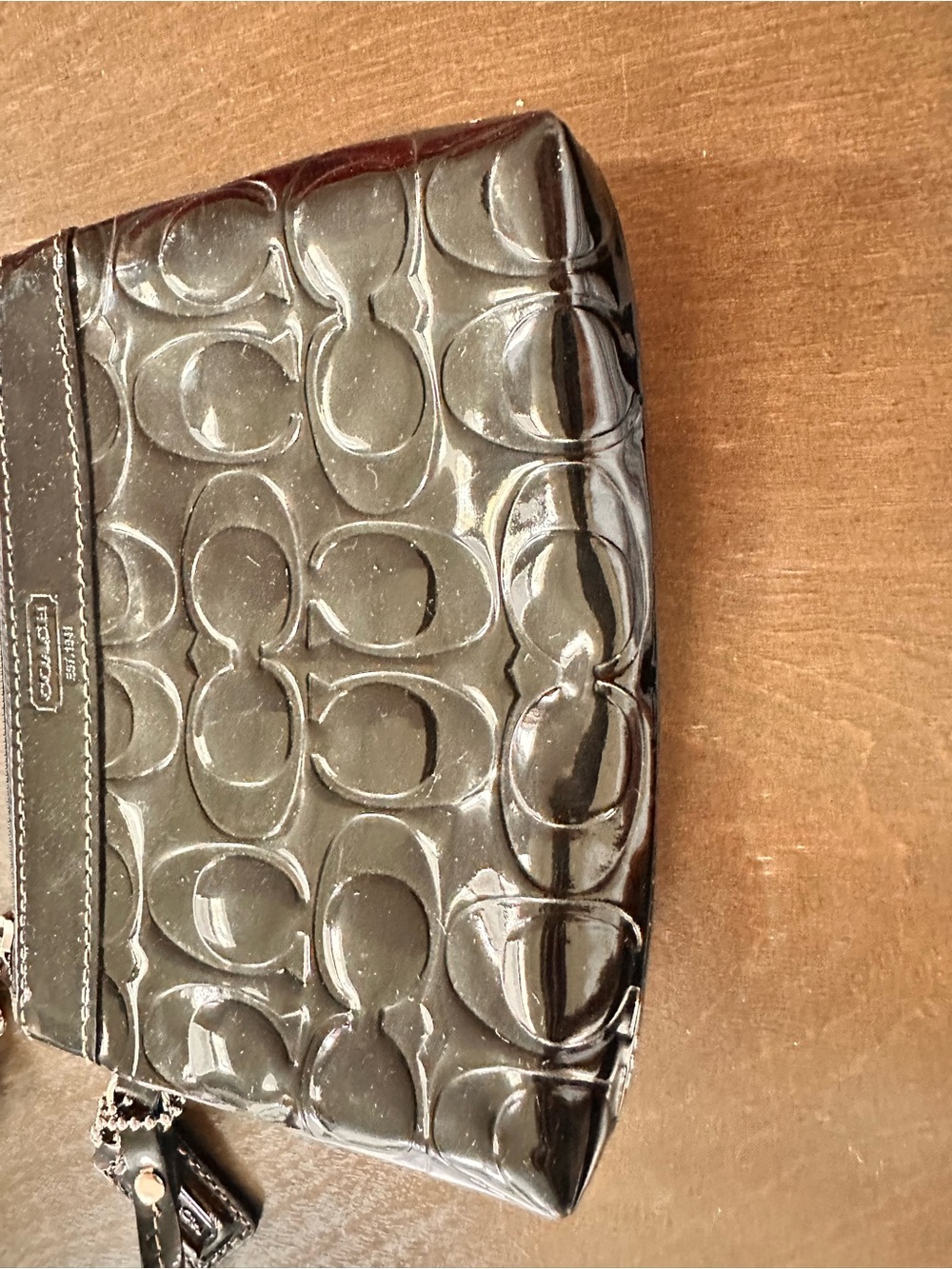 COACH Black Patent Signature Wristlet in black